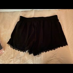 Hollister stretch waistband shorts with lace detail size L
